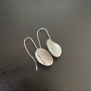Curved surface earrings